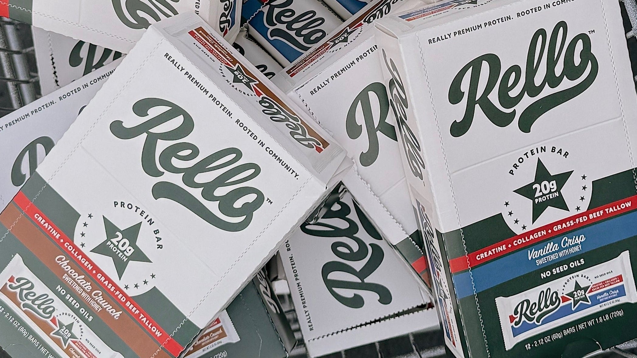 Multiple boxes of Reilo Protein Bars in a grocery cart